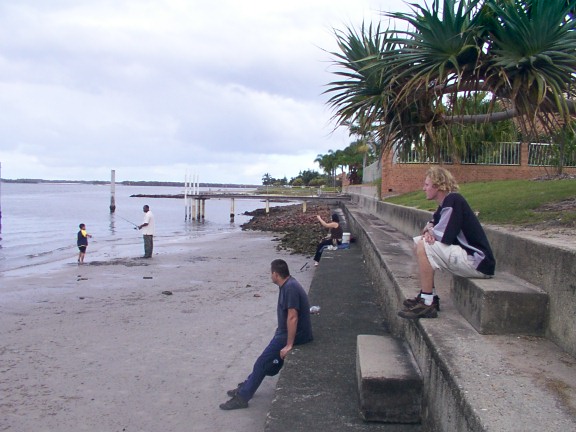 Sitting on the cement wall relaxing